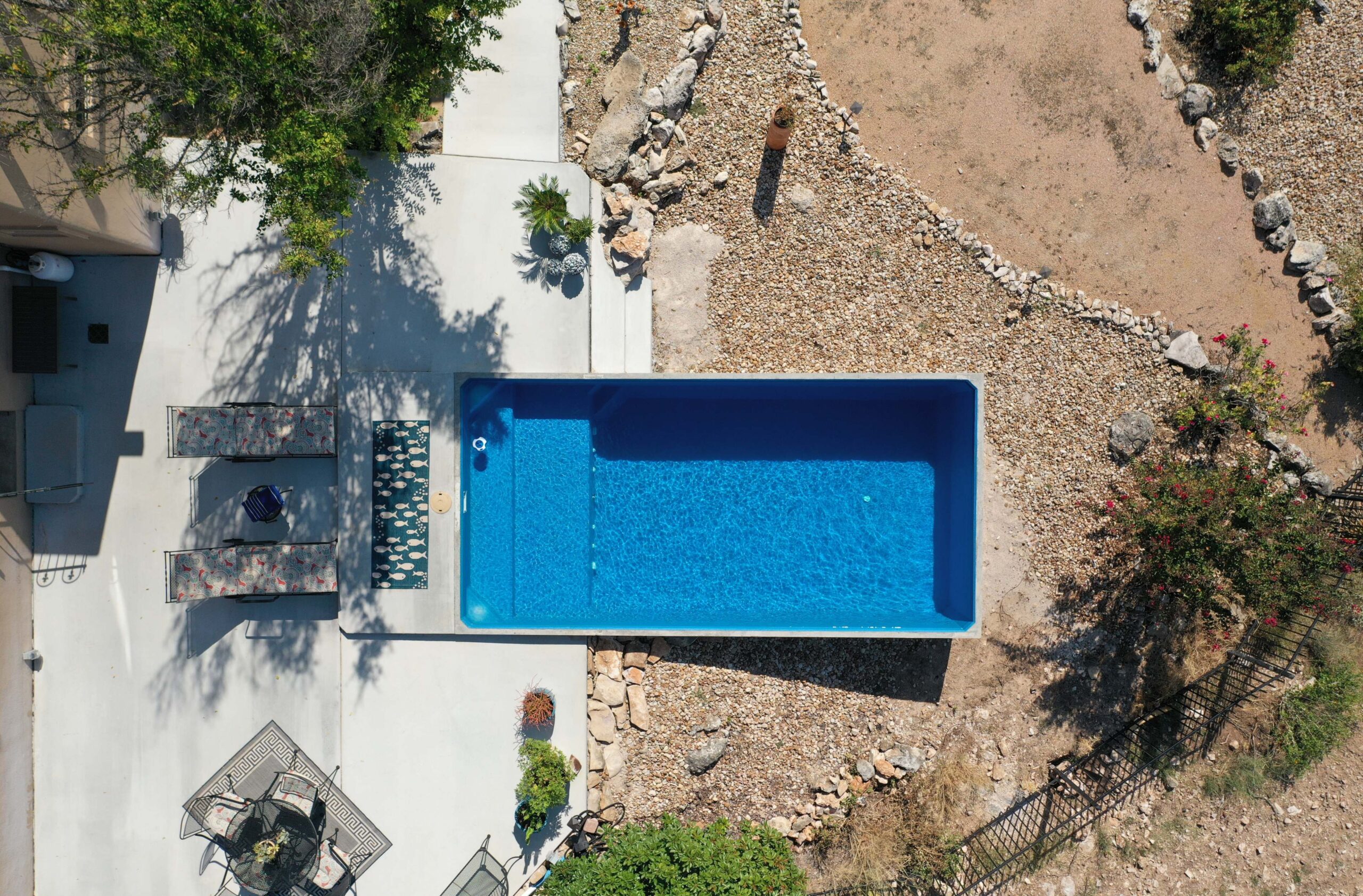 Max Model Plungie Pool in Hillside Backyard with Semi Inground Installation - Transform Your Outdoor Space with Trustwise Construction