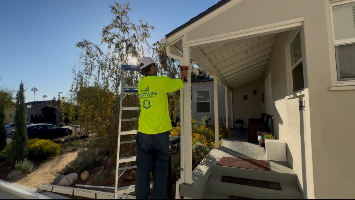 Expert installation in progress: Seamless gutters designed for efficiency and style.