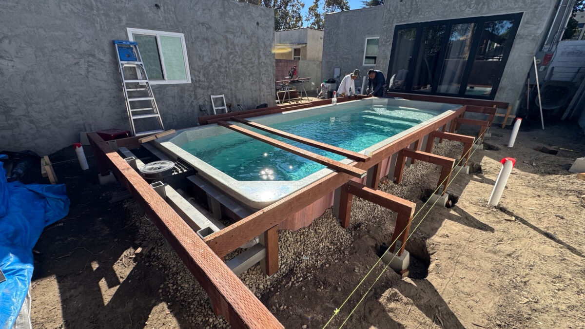 Plunge Pool and Deck Construction | Plunge pool with timber deck framing under construction around the pool.