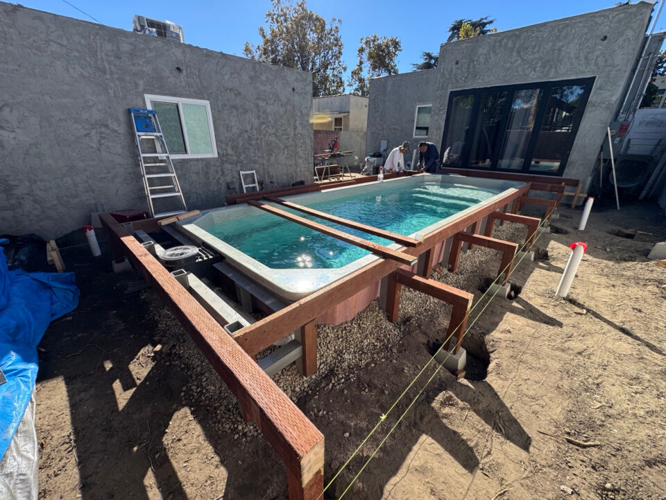 Plunge Pool and Deck Construction | Plunge pool with timber deck framing under construction around the pool.